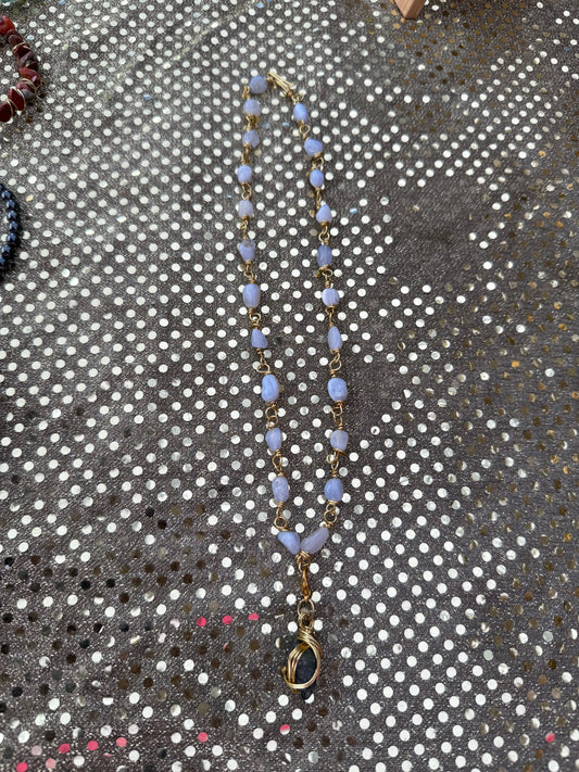 Handcrafted Calm Expression Mojo Bag for anxiety relief, emotional peace, and throat chakra healing.